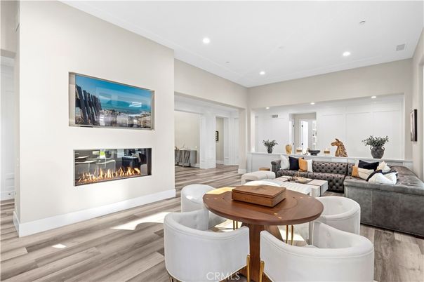 Dining room, Fireplace, Interior, Living room, Recessed Lighting, Wood Texture Flooring