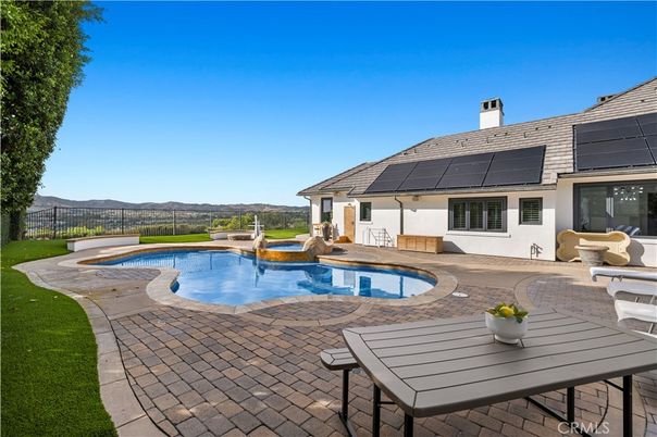 Exterior, Pool, Solar Panels