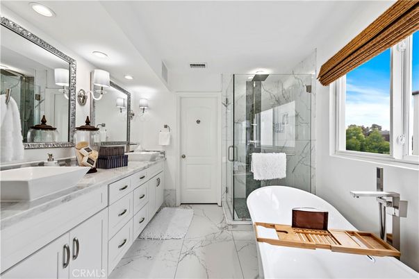 Bathroom, Dual Sink Vanities, Free Standing Baths, Glass Shower, Interior, Marble, Marble Walls, Recessed Lighting
