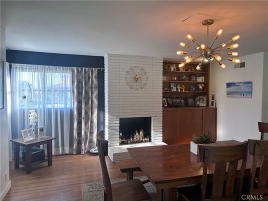 Dining room, Fireplace, Interior, Pendant Lights, Wood Texture Flooring