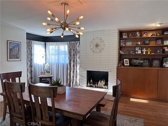 Dining room, Fireplace, Interior, Pendant Lights, Wood Texture Flooring