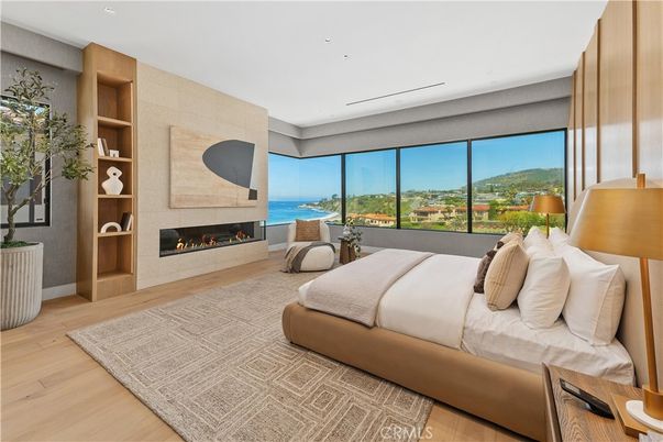 Bedroom, Fireplace, Interior, Recessed Lighting, Water, Wood Texture Flooring