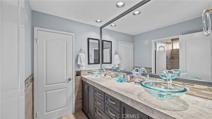 Bathroom, Dual Sink Vanities, Interior, Recessed Lighting, Wood Texture Flooring