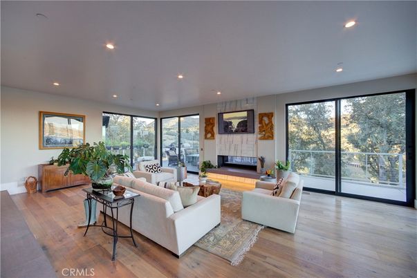 Fireplace, Interior, Living room, Recessed Lighting, Wood Texture Flooring