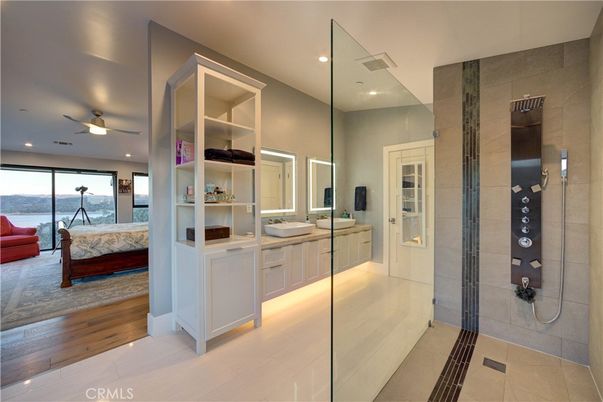 Bathroom, Bedroom, Glass Shower, Interior, Recessed Lighting, Water, Wood Texture Flooring