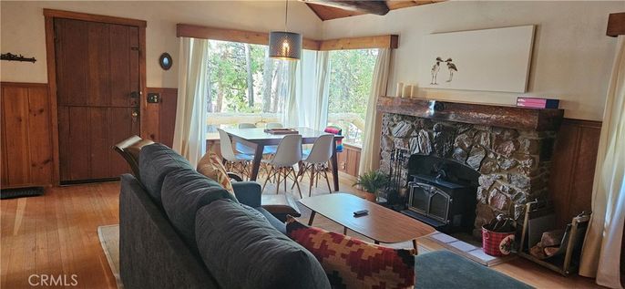 Dining room, Fireplace, Interior, Living room, Pendant Lights, Wooden Beams, Wood Texture Flooring
