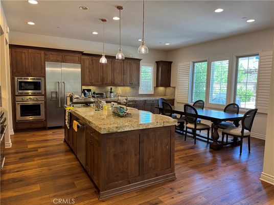 Dining room, Interior, Kitchen, Pendant Lights, Recessed Lighting, Stainless Steel Appliances, Wood Texture Flooring