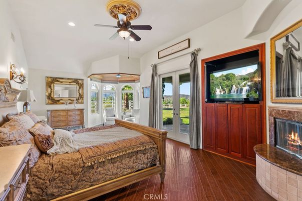 Bedroom, Fireplace, Interior, Recessed Lighting, Wood Texture Flooring