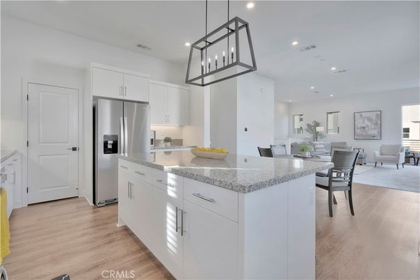 Dining room, Interior, Kitchen, Living room, Pendant Lights, Recessed Lighting, Stainless Steel Appliances, Wood Texture Flooring