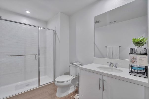Bathroom, Glass Shower, Interior, Recessed Lighting, Wood Texture Flooring