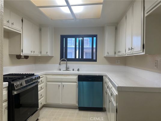 Interior, Kitchen, Stainless Steel Appliances, Tile Countertops