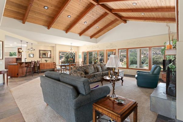 Chandelier, Dining room, Interior, Living room, Pendant Lights, Recessed Lighting, Wooden Beams, Wooden Ceilings