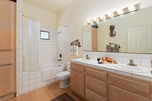 Bathroom, Dual Sink Vanities, Interior, Tile Countertops, Wood Texture Flooring