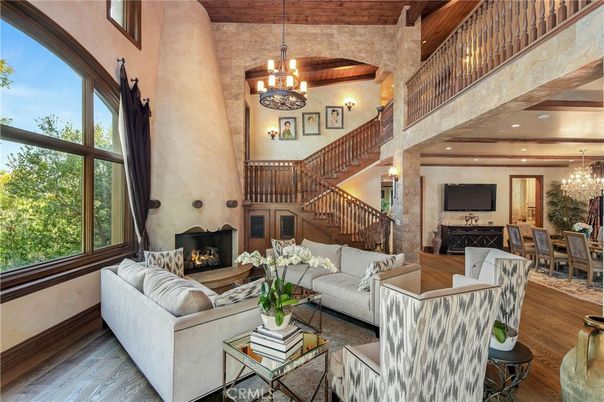 Chandelier, Dining room, Fireplace, Interior, Living room, Pendant Lights, Recessed Lighting, Wooden Beams, Wooden Ceilings, Wood Texture Flooring