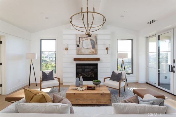 Fireplace, Interior, Living room, Pendant Lights, Recessed Lighting, Stone Walls, Wood Texture Flooring