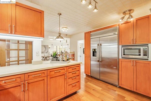 Interior, Kitchen, Pendant Lights, Stainless Steel Appliances, Wood Texture Flooring