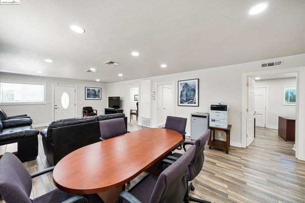 Dining room, Fireplace, Interior, Living room, Recessed Lighting, Wood Texture Flooring