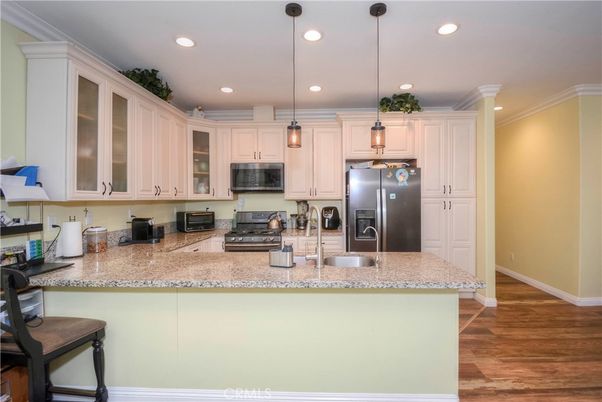 Interior, Kitchen, Pendant Lights, Recessed Lighting, Stainless Steel Appliances, Wood Texture Flooring