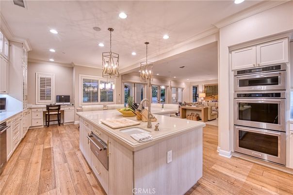 Chandelier, Interior, Kitchen, Pendant Lights, Recessed Lighting, Stainless Steel Appliances, Wood Texture Flooring