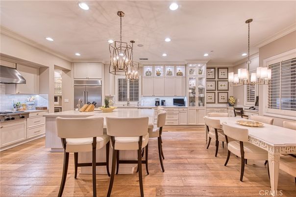 Chandelier, Dining room, Interior, Kitchen, Pendant Lights, Recessed Lighting, Stainless Steel Appliances, Wood Texture Flooring