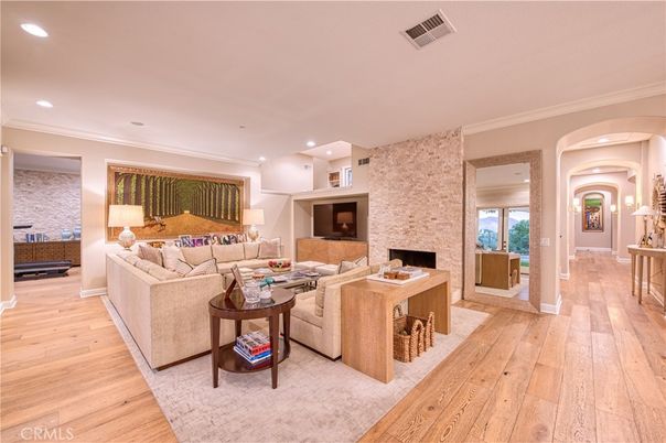 Fireplace, Interior, Living room, Recessed Lighting, Stone Walls, Wood Texture Flooring