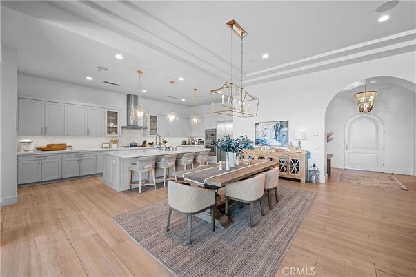 Dining room, Interior, Kitchen, Pendant Lights, Recessed Lighting, Stainless Steel Appliances, Wood Texture Flooring