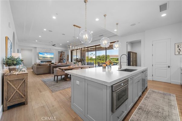 Dining room, Interior, Kitchen, Living room, Pendant Lights, Recessed Lighting, Stainless Steel Appliances, Wood Texture Flooring