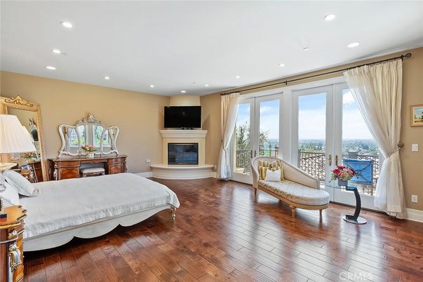 Bedroom, Fireplace, Interior, Recessed Lighting, Wood Texture Flooring
