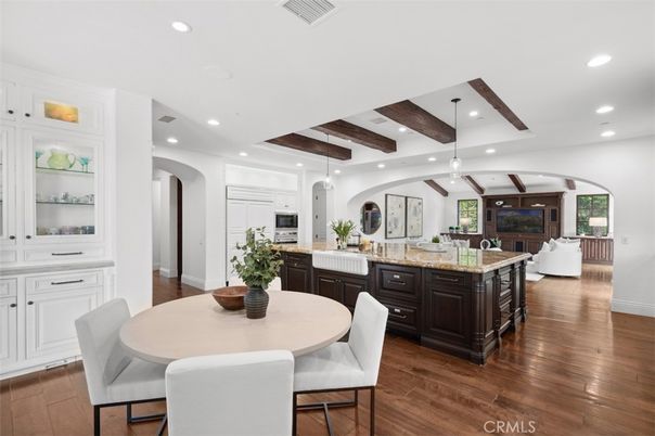 Dining room, Interior, Kitchen, Living room, Pendant Lights, Recessed Lighting, Stainless Steel Appliances, Wooden Beams, Wood Texture Flooring