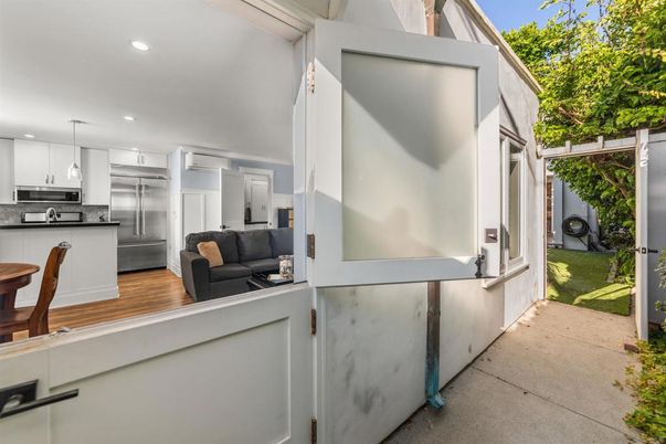 Exterior, Kitchen, Recessed Lighting, Stainless Steel Appliances, Wood Texture Flooring