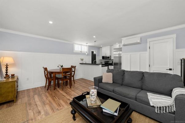 Dining room, Interior, Kitchen, Living room, Pendant Lights, Recessed Lighting, Stainless Steel Appliances, Wood Texture Flooring