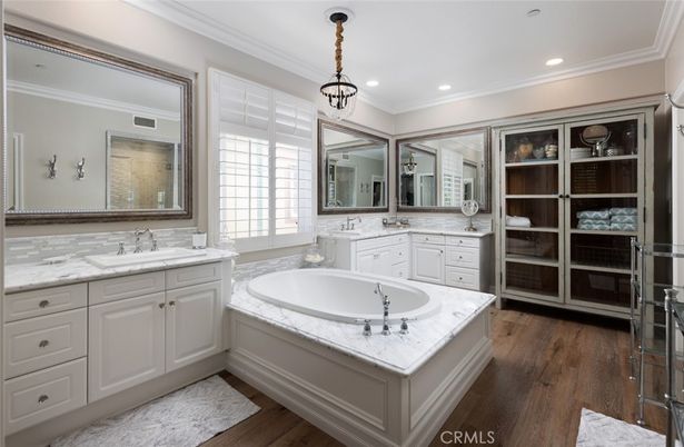 Bathroom, Dual Sink Vanities, Interior, Pendant Lights, Recessed Lighting, Wood Texture Flooring