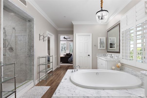 Bathroom, Chandelier, Glass Shower, Interior, Marble Walls, Pendant Lights, Wood Texture Flooring