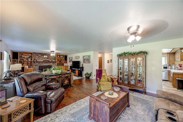 Dining room, Fireplace, Interior, Kitchen, Living room, Stone Walls, Wood Texture Flooring