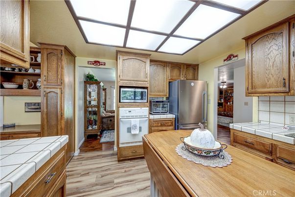 Interior, Kitchen, Tile Countertops, Wood Texture Flooring