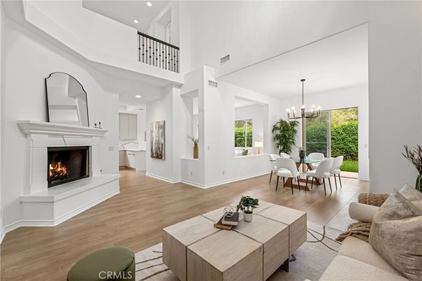 Chandelier, Dining room, Fireplace, Interior, Living room, Recessed Lighting, Wood Texture Flooring
