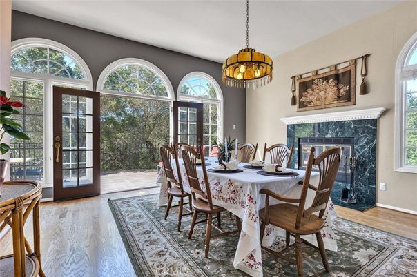 Chandelier, Dining room, Fireplace, Interior, Pendant Lights, Wood Texture Flooring
