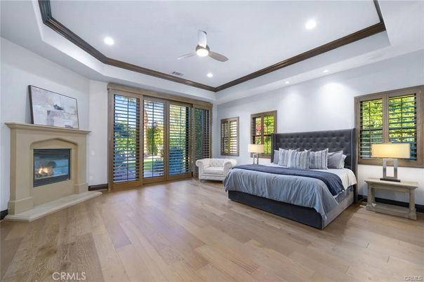 Bedroom, Fireplace, Interior, Recessed Lighting, Wood Texture Flooring