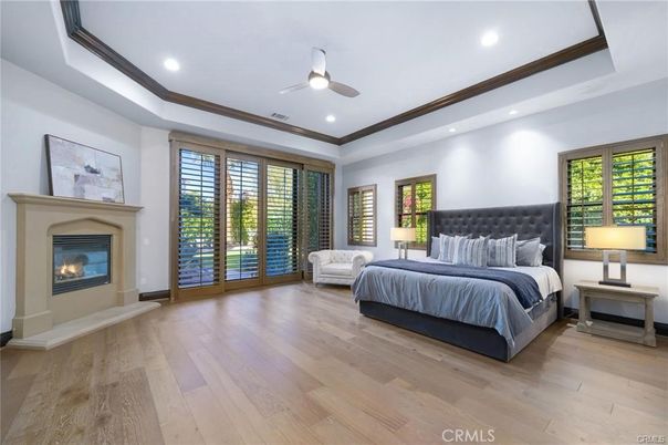 Bedroom, Fireplace, Interior, Recessed Lighting, Wood Texture Flooring