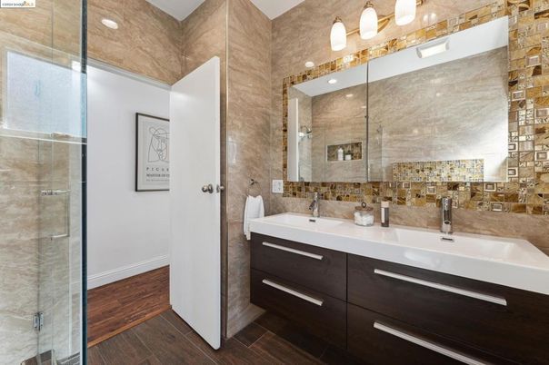 Bathroom, Dual Sink Vanities, Glass Shower, Interior, Wood Texture Flooring