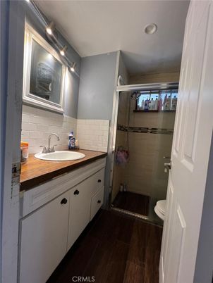 Bathroom, Glass Shower, Interior, Recessed Lighting, Wood Texture Flooring