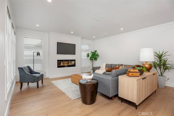 Fireplace, Interior, Living room, Recessed Lighting, Wood Texture Flooring