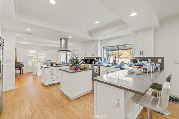 Dining room, Interior, Kitchen, Recessed Lighting, Stainless Steel Appliances, Wood Texture Flooring
