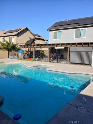 Exterior, Pool, Solar Panels