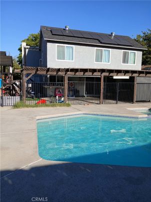 Exterior, Pool, Solar Panels