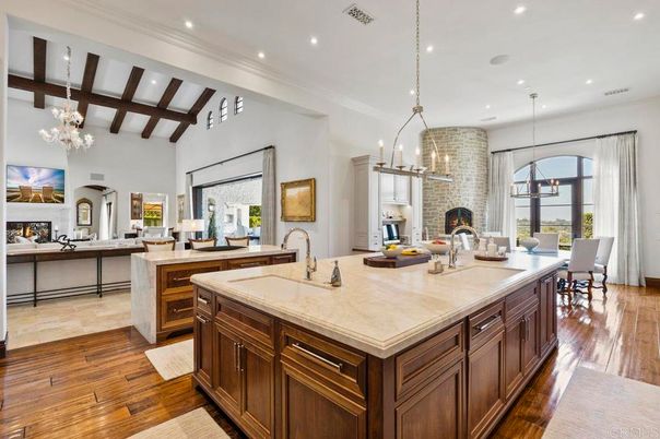 Chandelier, Dining room, Fireplace, Interior, Kitchen, Pendant Lights, Recessed Lighting, Wooden Beams, Wood Texture Flooring