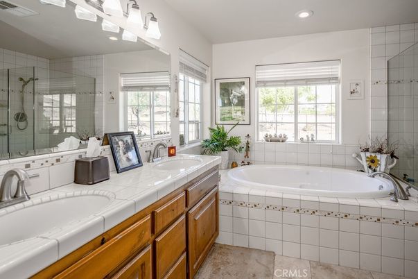 Bathroom, Dual Sink Vanities, Glass Shower, Interior, Recessed Lighting, Tile Countertops