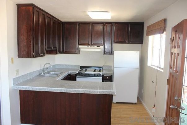 Interior, Kitchen, Tile Countertops, Wood Texture Flooring