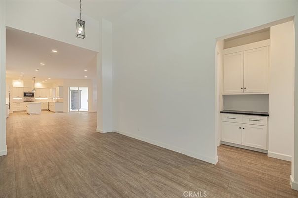 Empty room, Interior, Kitchen, Pendant Lights, Recessed Lighting, Wood Texture Flooring