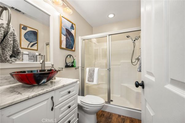 Bathroom, Glass Shower, Interior, Recessed Lighting, Wood Texture Flooring